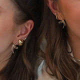 ELONGATED BOW DIAMOND ACCENT EARRINGS